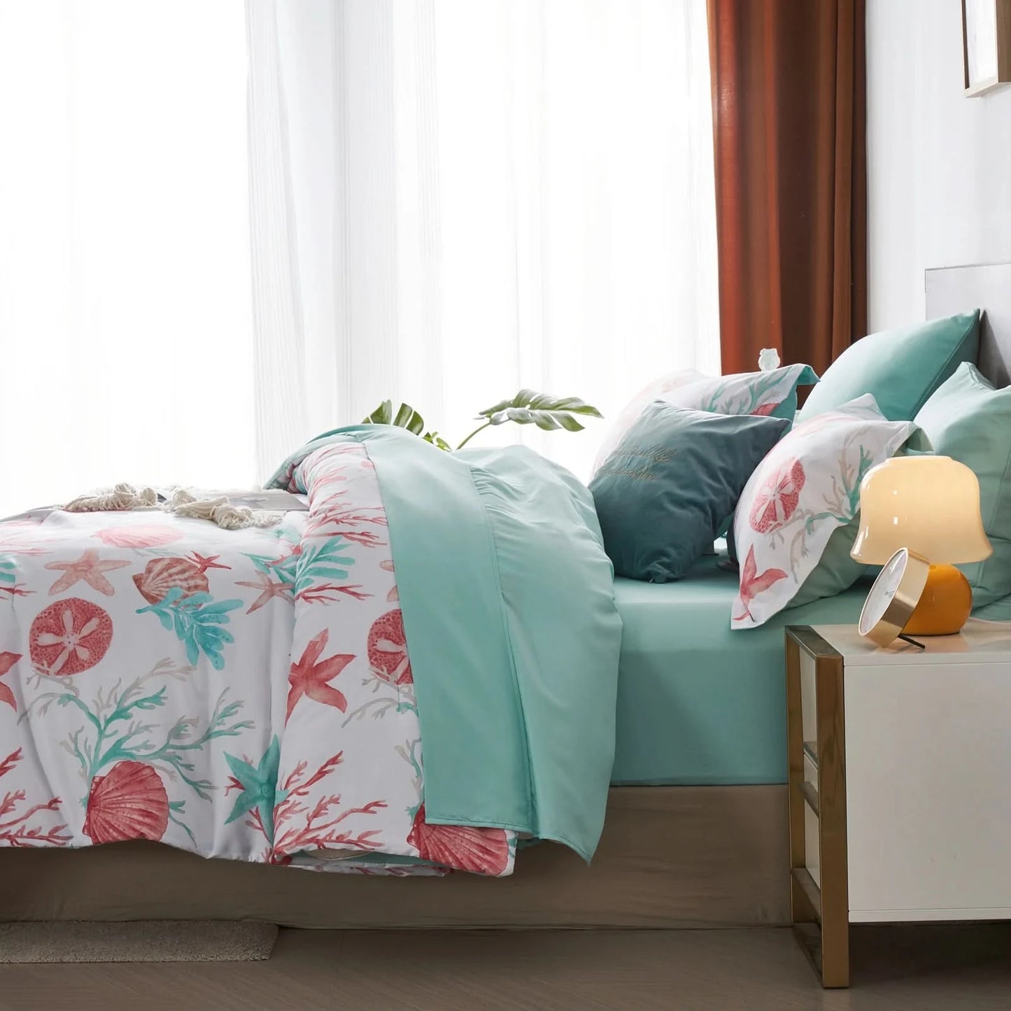 Bedroom with a bed featuring floral bedding and teal sheets, next to a nightstand with a lamp.
Microfiber Bedding Set, Queen Comforter Set, Lightweight Comforter, Pinch Pleat Bedding, Quilted Comforter, Solid Color Bedding, Soft Bedding Set, Elegant Bedding, All Season Comforter, Brushed Microfiber, Modern Bedroom Decor, Gift Bedding Set, Fade Resistant Bedding, Cozy Bedding Set, Hotel Style Bedding, Bedroom Essentials, Bed Comforter with Pillowcases, Non-Toxic Bedding, Machine Washable Bedding, Minimalist