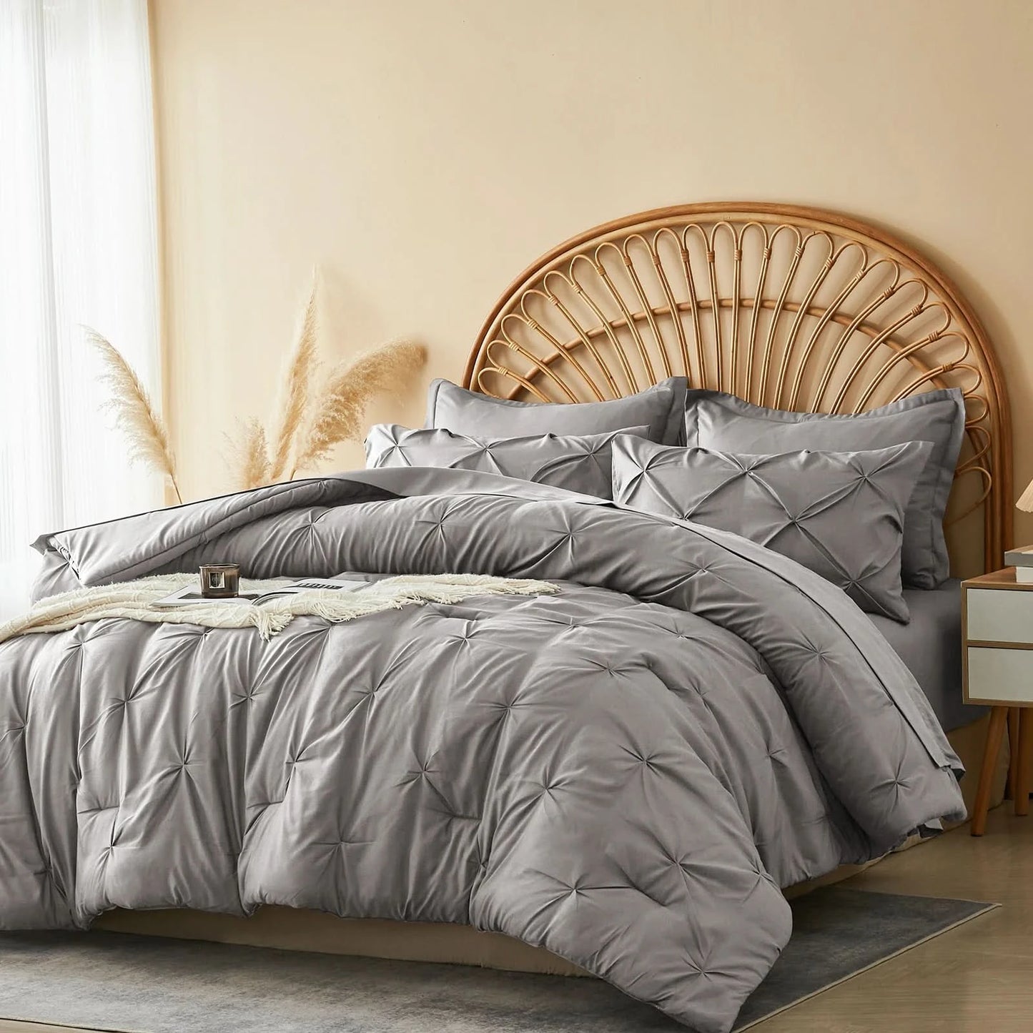 Gray quilted comforter set on a bed with a wicker headboard in a bedroom
setting.
Queen Bedding Set, 7 Piece Bedding Set, Pinch Pleat Comforter, Geometric Bedding, Microfiber Bedding, All Season Comforter, Soft Bedding, Machine Washable, Hypoallergenic Comforter, Luxury Bedding Set, Polyester Bedding, Hotel Quality Bedding, Elegant Bedroom Decor, Gift Bedding Set, Modern Bedding