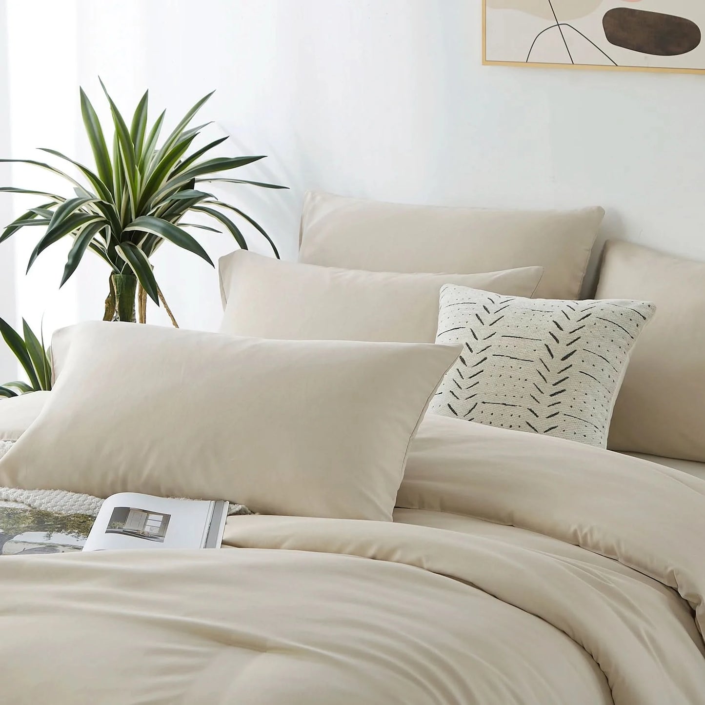 Neatly made bed with beige bedding and pillows in a bright bedroom.
Microfiber comforter set
Solid color bedding set
Soft bedding for all seasons
Twin/Queen/King comforter
Lightweight bed set
Wrinkle-resistant bedding
Machine washable comforter
Minimalist bedding
Dorm room bedding
Gift bedding set