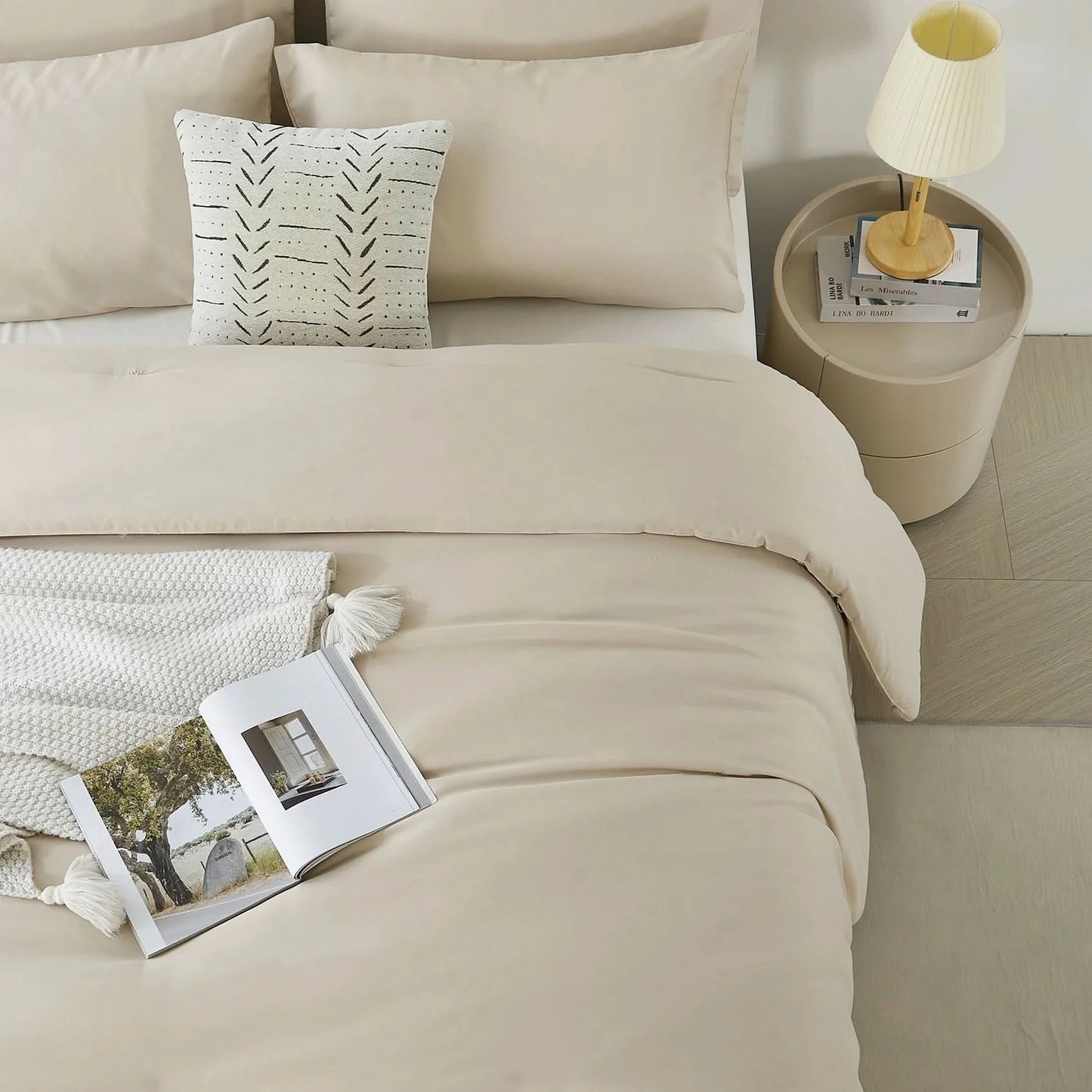 Neatly made bed with beige bedding and pillows, next to a nightstand with a lamp.
Microfiber comforter set
Solid color bedding set
Soft bedding for all seasons
Twin/Queen/King comforter
Lightweight bed set
Wrinkle-resistant bedding
Machine washable comforter
Minimalist bedding
Dorm room bedding
Gift bedding set