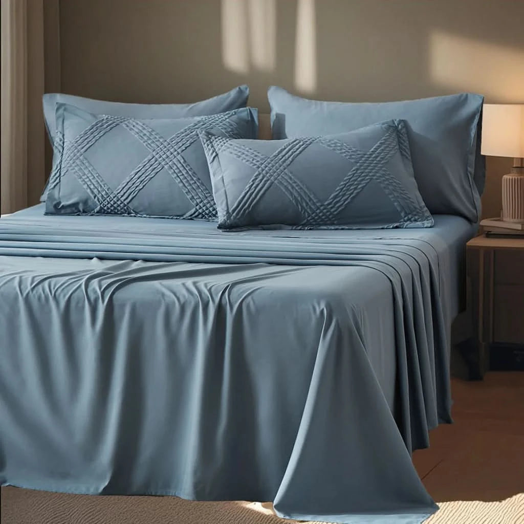 Blue bedspread set on a bed with matching pillows in a bedroom setting.
Quilted queen bedding set
7-piece comforter set
Brushed microfiber bedding
Ultra-soft quilt set
Lightweight comforter set
Machine washable bedding
All-season bedding set
Luxury bed set queen size
Bedding gift set
Modern bedroom decor