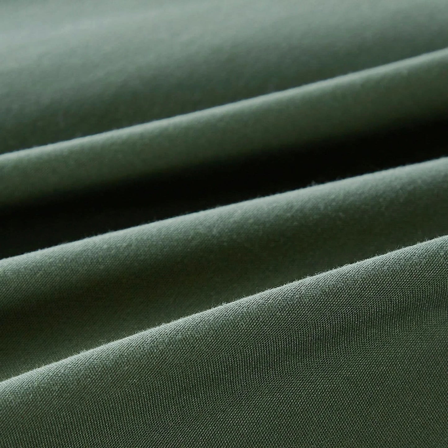 Close-up of green fabric with a textured surface
Microfiber comforter set
Solid color bedding set
Soft bedding for all seasons
Twin/Queen/King comforter
Lightweight bed set
Wrinkle-resistant bedding
Machine washable comforter
Minimalist bedding
Dorm room bedding
Gift bedding set