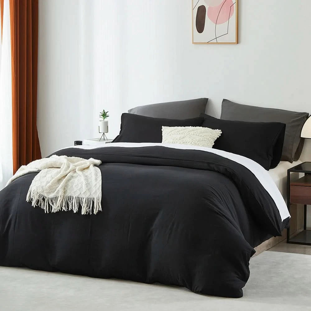 Bedroom with black bedding and white walls, featuring a bed with pillows and a blanket.
Microfiber Bedding Set, Queen Comforter Set, Lightweight Comforter, Pinch Pleat Bedding, Quilted Comforter, Solid Color Bedding, Soft Bedding Set, Elegant Bedding, All Season Comforter, Brushed Microfiber, Modern Bedroom Decor, Gift Bedding Set, Fade Resistant Bedding, Cozy Bedding Set, Hotel Style Bedding, Bedroom Essentials, Bed Comforter with Pillowcases, Non-Toxic Bedding, Machine Washable Bedding, Minimalist Bedding