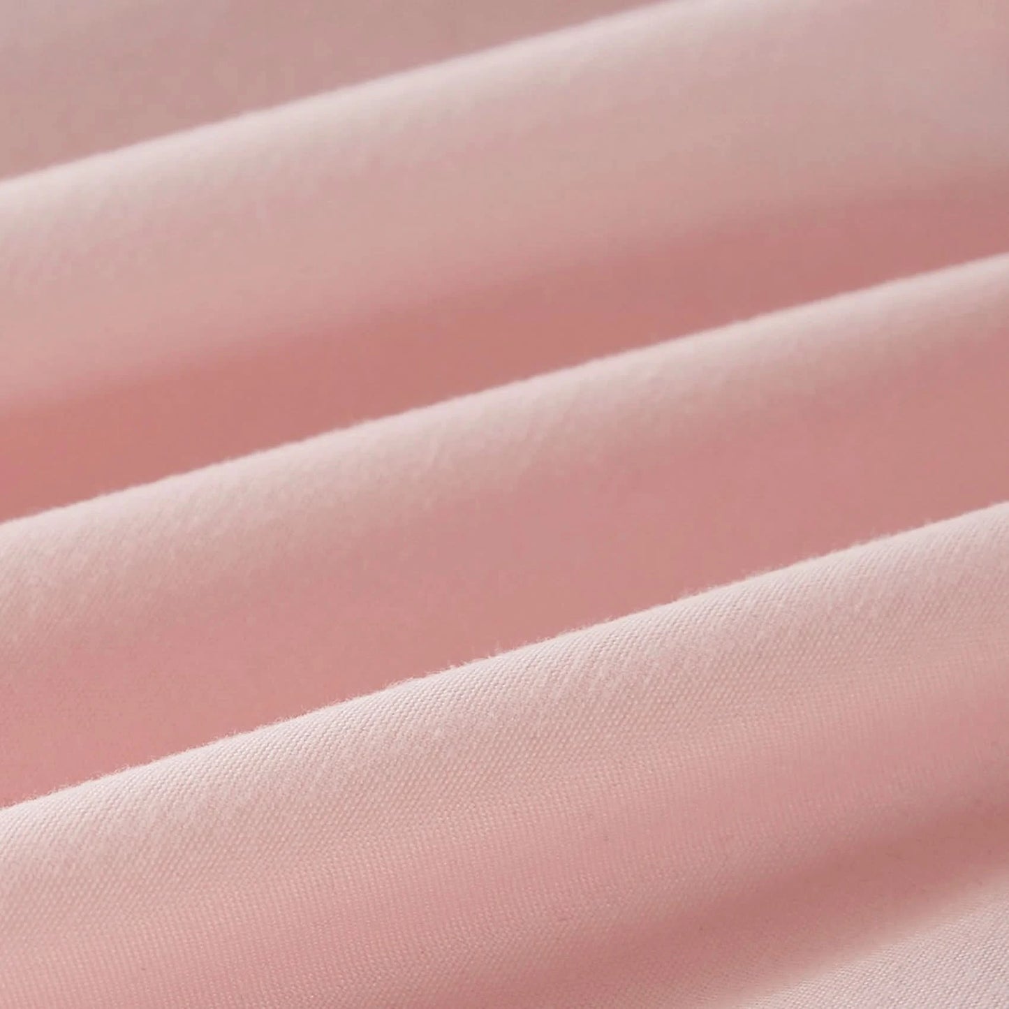 Close-up of pink fabric with a soft texture
Microfiber comforter set
Solid color bedding set
Soft bedding for all seasons
Twin/Queen/King comforter
Lightweight bed set
Wrinkle-resistant bedding
Machine washable comforter
Minimalist bedding
Dorm room bedding
Gift bedding set