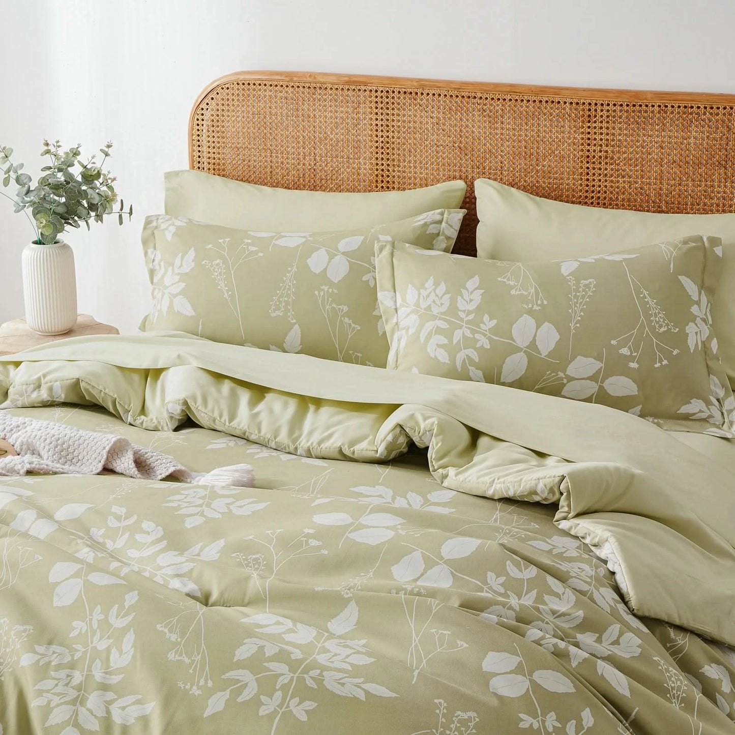 Bed with light green bedding featuring floral patterns, wooden headboard, and small plant on nightstand.
Blue bed with pillows and a blanket in a bedroom setting
Comfora Cozy Bedding Set
sage green bedding
white bedding set
comforter set queen
floral duvet cover
Comfora Cozy Bedding Set
plush comforter set cozy pack
ultra-soft all-season comforter and shams
luxury cozy bedding set online
warm textured comforter set King/Queen