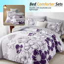 Floral patterned bed comforter set with pillows on a bed, featuring purple and white flowers.
Queen floral comforter set

Large floral print bedding

7-piece microfiber bedding set

All-season comforter

Brushed microfiber comforter

Luxury bed set for queen bed

Fade-resistant bedding

Machine washable comforter

Elegant bedroom décor set

Gift bedding set for holidays