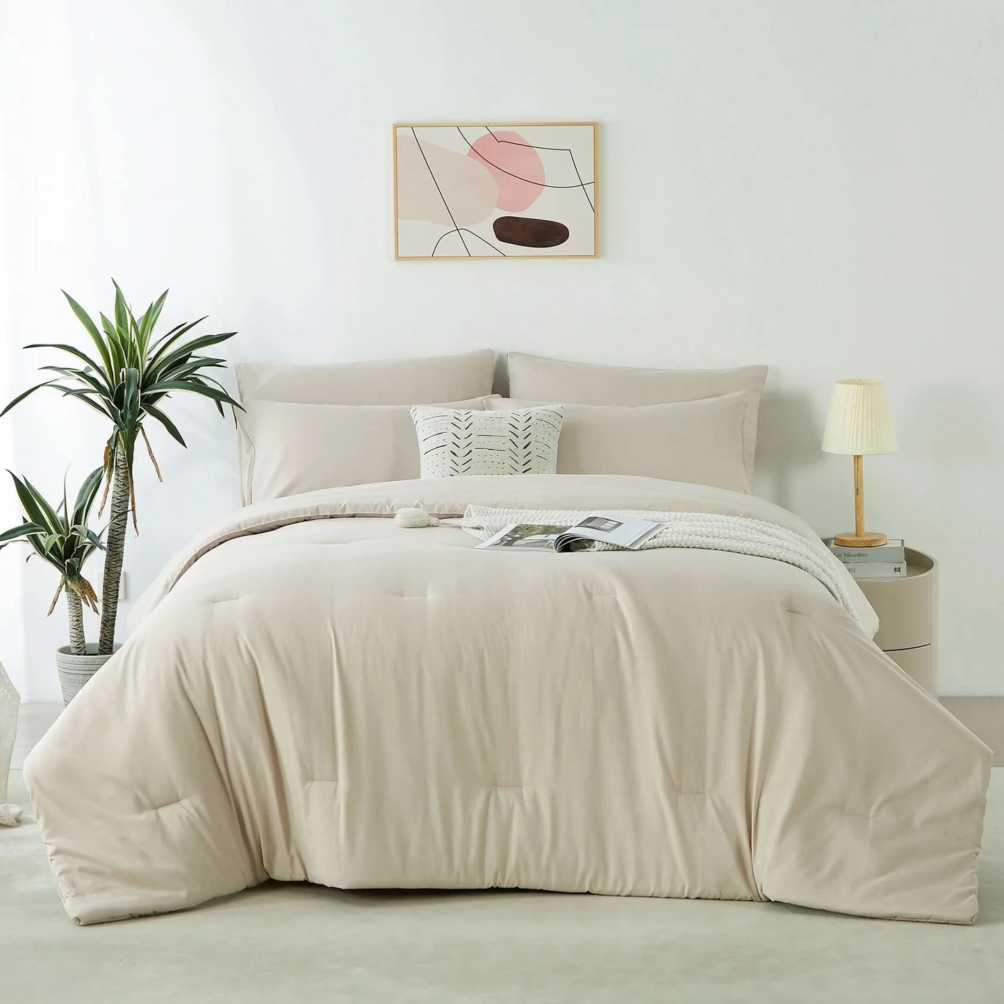 Beige comforter set on a bed in a bedroom with plants and a lamp.
Microfiber comforter set

Solid color bedding set

Soft bedding for all seasons

Twin/Queen/King comforter

Lightweight bed set

Wrinkle-resistant bedding

Machine washable comforter

Minimalist bedding

Dorm room bedding

Gift bedding set