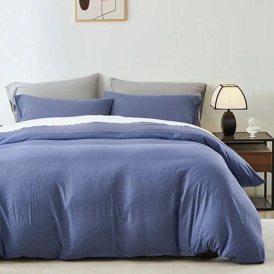 Blue bedding set on a bed with a lamp and nightstand in the background.
Microfiber Bedding Set, Queen Comforter Set, Lightweight Comforter, Pinch Pleat Bedding, Quilted Comforter, Solid Color Bedding, Soft Bedding Set, Elegant Bedding, All Season Comforter, Brushed Microfiber, Modern Bedroom Decor, Gift Bedding Set, Fade Resistant Bedding, Cozy Bedding Set, Hotel Style Bedding, Bedroom Essentials, Bed Comforter with Pillowcases, Non-Toxic Bedding, Machine Washable Bedding, Minimalist Bedding

