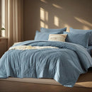 Blue textured comforter set on a bed with pillows in a bedroom setting.
Quilted queen bedding set

7-piece comforter set

Brushed microfiber bedding

Ultra-soft quilt set

Lightweight comforter set

Machine washable bedding

All-season bedding set

Luxury bed set queen size

Bedding gift set

Modern bedroom decor