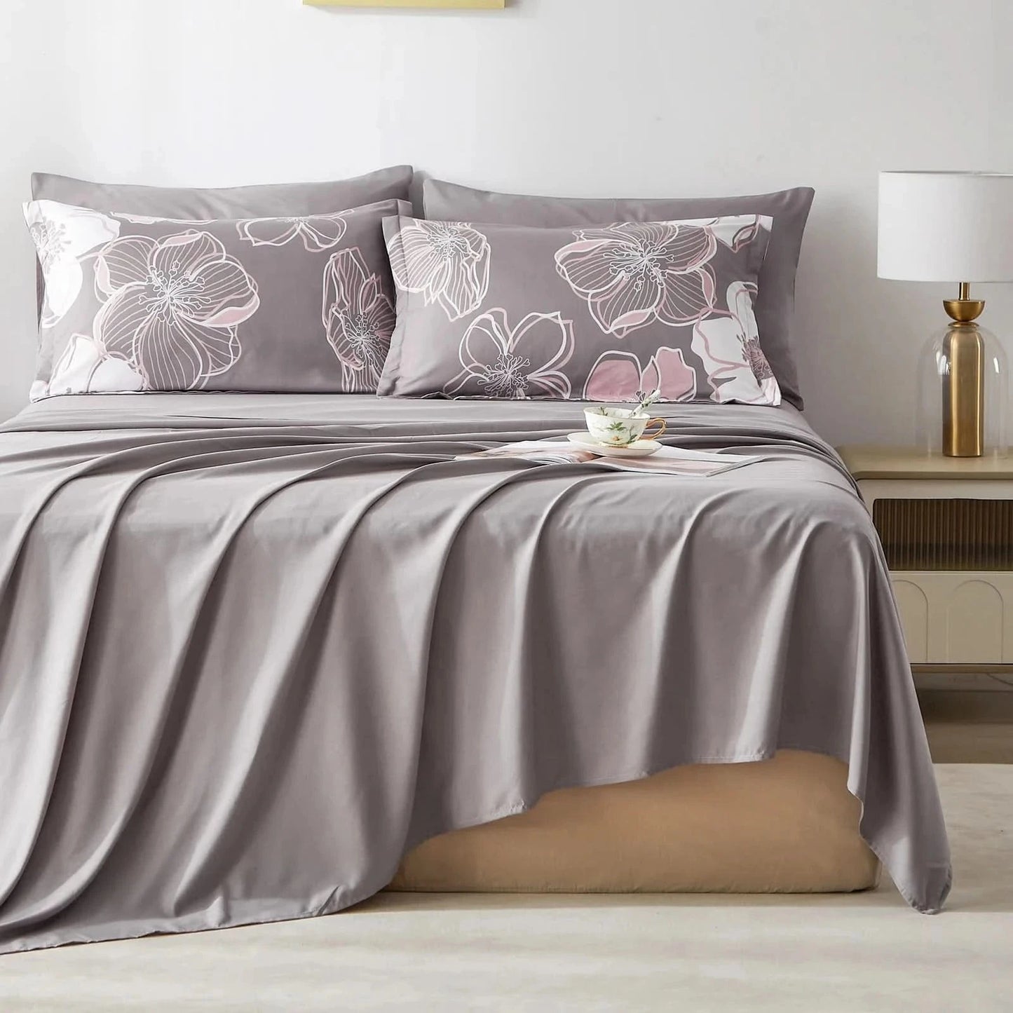 Gray floral bedding set on a bed with a lamp in the background
Queen floral comforter set

Large floral print bedding

7-piece microfiber bedding set

All-season comforter

Brushed microfiber comforter

Luxury bed set for queen bed

Fade-resistant bedding

Machine washable comforter

Elegant bedroom décor set

Gift bedding set for holidays
