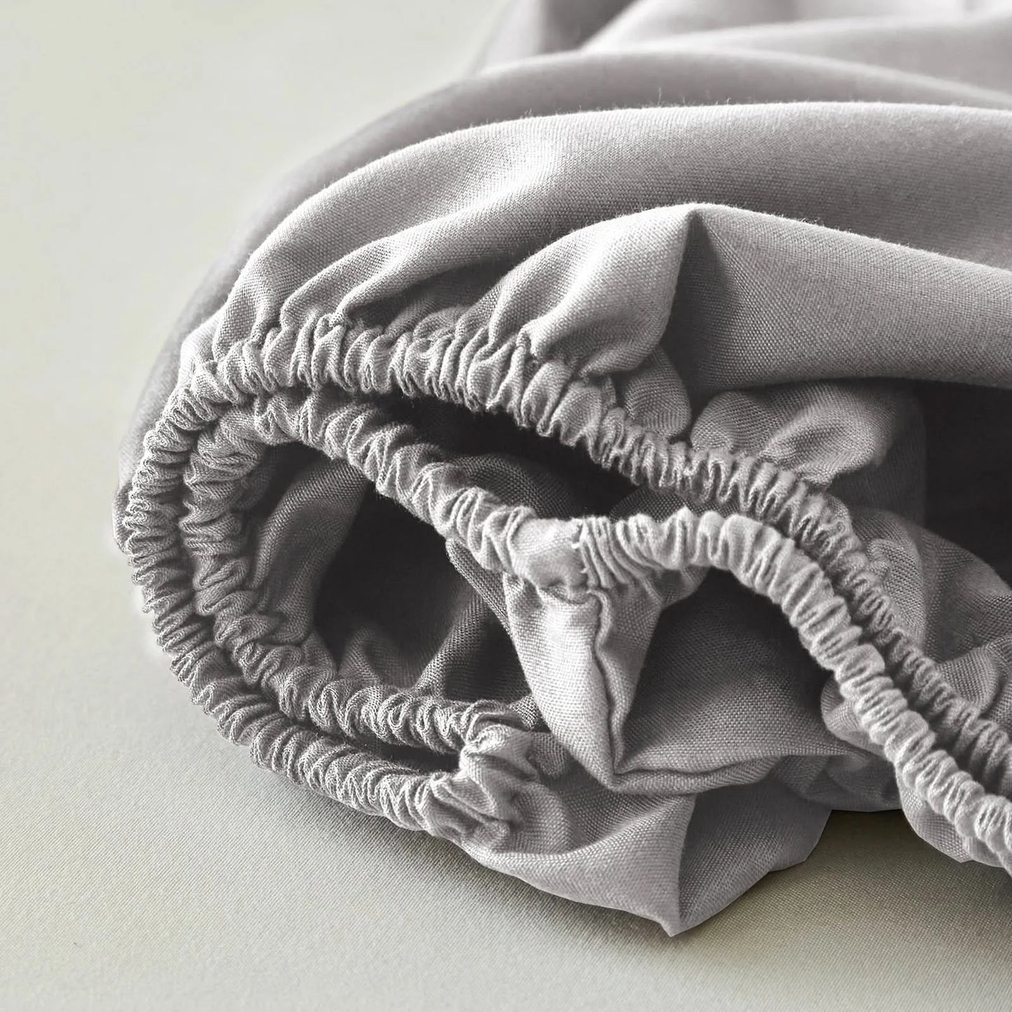 Folded gray fitted sheet on a light surface
Queen Bedding Set, 7 Piece Bedding Set, Pinch Pleat Comforter, Geometric Bedding, Microfiber Bedding, All Season Comforter, Soft Bedding, Machine Washable, Hypoallergenic Comforter, Luxury Bedding Set, Polyester Bedding, Hotel Quality Bedding, Elegant Bedroom Decor, Gift Bedding Set, Modern Bedding