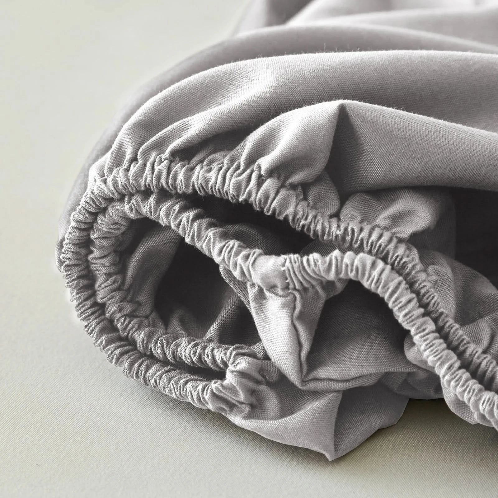 Folded gray fitted sheet on a light surface
Queen Bedding Set, 7 Piece Bedding Set, Pinch Pleat Comforter, Geometric Bedding, Microfiber Bedding, All Season Comforter, Soft Bedding, Machine Washable, Hypoallergenic Comforter, Luxury Bedding Set, Polyester Bedding, Hotel Quality Bedding, Elegant Bedroom Decor, Gift Bedding Set, Modern Bedding