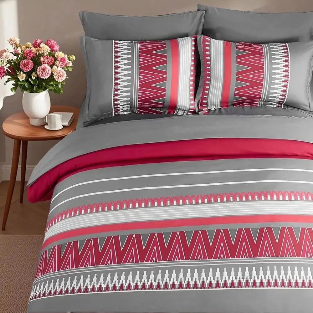 Gray and red striped bedding set with decorative pillows on a bed, next to a side table with flowers.
Queen printed comforter set

7-piece microfiber bedding set

All-season bed comforter

Soft brushed microfiber bedding

Luxury quilt set for queen bed

Fade-resistant bedding set

Machine washable comforter set

Elegant bedroom decor

Gift bedding set for women

Hypoallergenic bedding