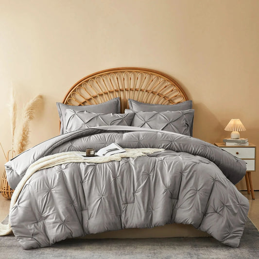 Gray comforter set on a bed with a wooden headboard and nightstand in a bedroom setting.
Queen Bedding Set, 7 Piece Bedding Set, Pinch Pleat Comforter, Geometric Bedding, Microfiber Bedding, All Season Comforter, Soft Bedding, Machine Washable, Hypoallergenic Comforter, Luxury Bedding Set, Polyester Bedding, Hotel Quality Bedding, Elegant Bedroom Decor, Gift Bedding Set, Modern Bedding