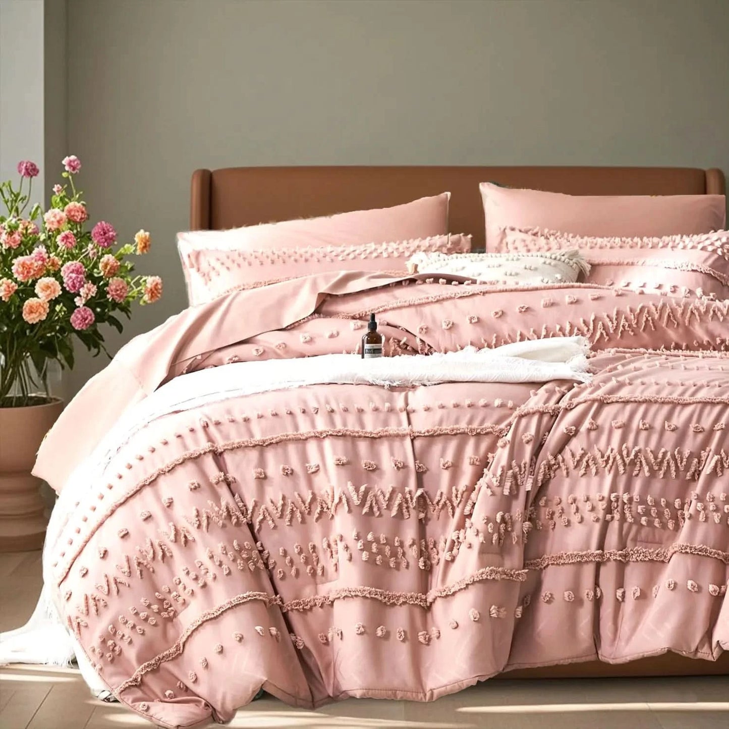 Pink textured comforter set on a bed with a vase of flowers in the corner.
Queen size bedding set

Tufted comforter set

Microfiber bed set

Luxury bedding gift

All-season quilt set

Soft and cozy bed set

Hypoallergenic bedding

Easy care bedding

Full queen bed ensemble
