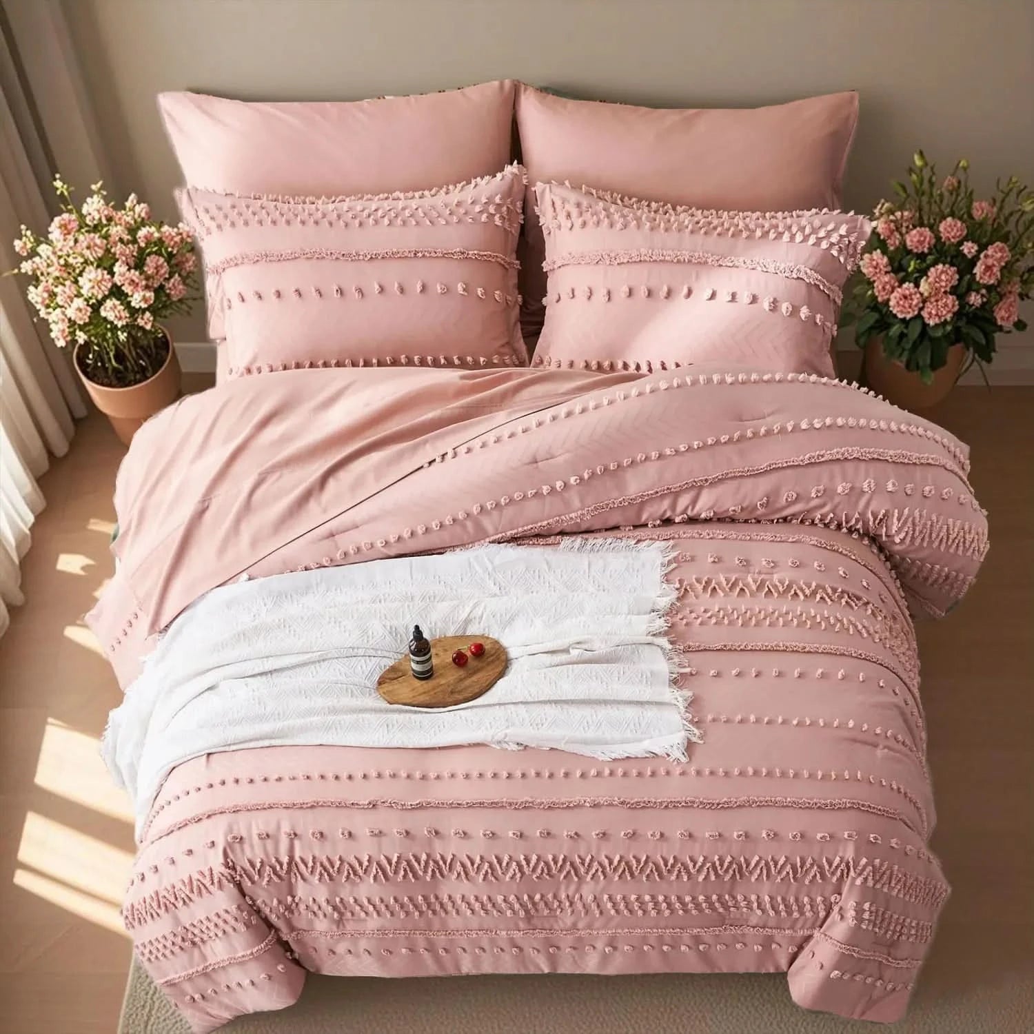 Pink textured duvet set on a bed with decorative pillows and flowers in the room.
Queen size bedding set

Tufted comforter set

Microfiber bed set

Luxury bedding gift

All-season quilt set

Soft and cozy bed set

Hypoallergenic bedding

Easy care bedding

Full queen bed ensemble