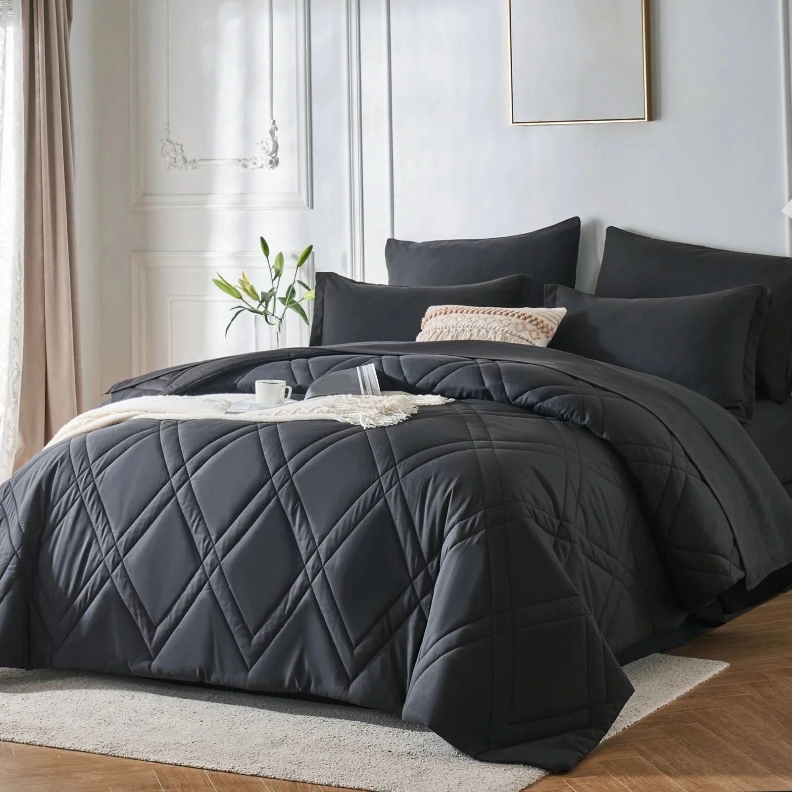 Dark gray quilted comforter set on a bed in a bedroom with light decor.
Microfiber bedding set

Queen and King bedding

Soft comforter set

Modern bedroom decor

Machine washable bedding

Polyester comforter

Cozy all-season bedding

Brushed microfiber

Lightweight and warm comforter

Bedding set with pillowcases