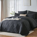 Dark gray quilted comforter set on a bed in a bedroom with light decor.
Microfiber bedding set

Queen and King bedding

Soft comforter set

Modern bedroom decor

Machine washable bedding

Polyester comforter

Cozy all-season bedding

Brushed microfiber

Lightweight and warm comforter

Bedding set with pillowcases