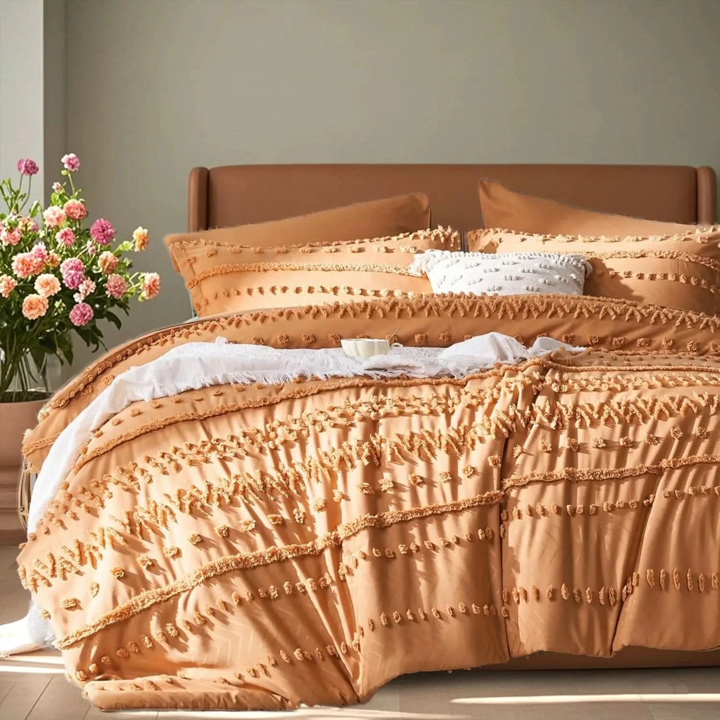 Bed with textured peach-colored bedding and pillows, next to a vase of flowers on a wooden surface.
Queen size bedding set

Tufted comforter set

Microfiber bed set

Luxury bedding gift

All-season quilt set

Soft and cozy bed set

Hypoallergenic bedding

Easy care bedding

Full queen bed ensemble