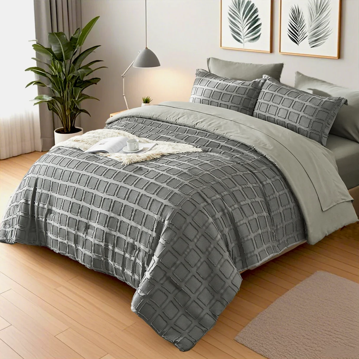 Gray checkered comforter set on a bed in a bedroom with plants and wall art.

Floral textured comforter

Ultra-soft microfiber comforter

Cut flower design bedding

All-season quilt set

Lightweight comforter set

Solid color bed set

Machine washable bedding

Fade-resistant bedding

Cozy bedroom gift set