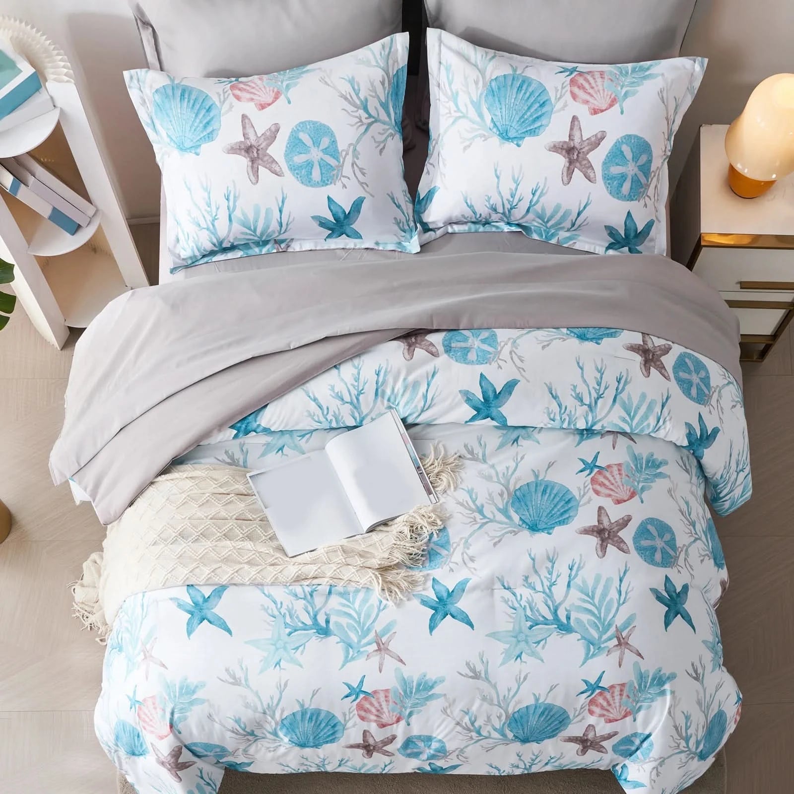 Bedding set with seashell pattern on a bed in a bedroom setting.
Microfiber Bedding Set, Queen Comforter Set, Lightweight Comforter, Pinch Pleat Bedding, Quilted Comforter, Solid Color Bedding, Soft Bedding Set, Elegant Bedding, All Season Comforter, Brushed Microfiber, Modern Bedroom Decor, Gift Bedding Set, Fade Resistant Bedding, Cozy Bedding Set, Hotel Style Bedding, Bedroom Essentials, Bed Comforter with Pillowcases, Non-Toxic Bedding, Machine Washable Bedding, Minimalist Bedding
