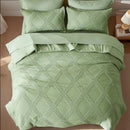 Green quilted bedding set on a bed with pillows in a bedroom setting.

7-piece comforter set

Brushed microfiber bedding

Ultra-soft quilt set

Lightweight comforter set

Machine washable bedding

All-season bedding set

Luxury bed set queen size

Bedding gift set

Modern bedroom decor