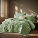 Green textured comforter set on a bed in a bedroom with soft lighting.

7-piece comforter set

Brushed microfiber bedding

Ultra-soft quilt set

Lightweight comforter set

Machine washable bedding

All-season bedding set

Luxury bed set queen size

Bedding gift set

Modern bedroom decor