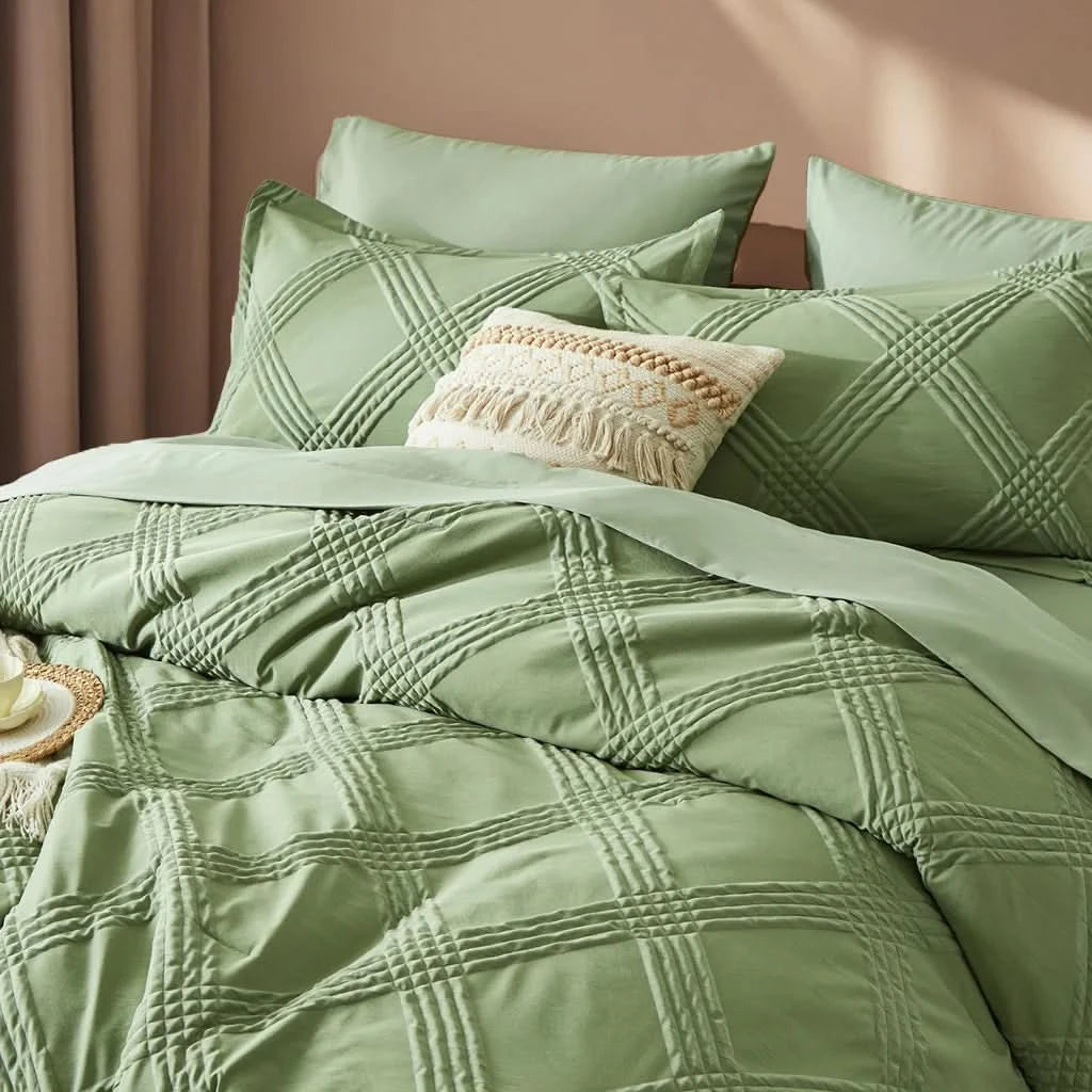 Green textured bedding set on a bed with pillows and a beige pillow.

7-piece comforter set

Brushed microfiber bedding

Ultra-soft quilt set

Lightweight comforter set

Machine washable bedding

All-season bedding set

Luxury bed set queen size

Bedding gift set

Modern bedroom decor