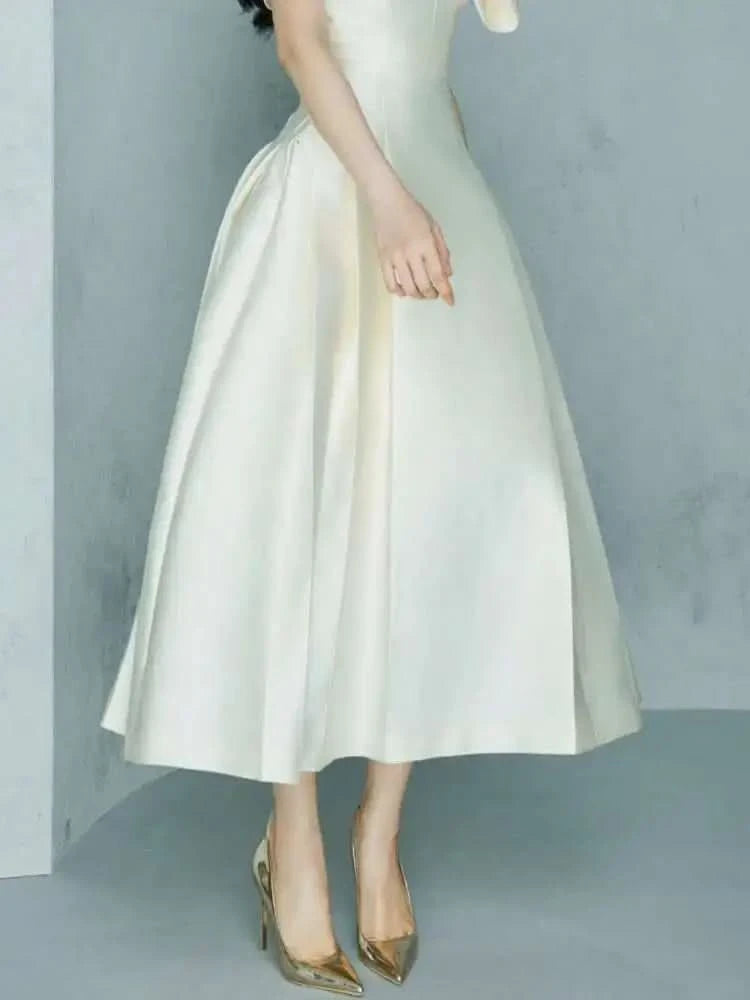 UCXQ Elegant Long Dress Fairy Style V-neck Hollow Waist 3D Bow Pocket Fashion Party Dresses For Women 2025 Spring Summer 23A9338 - M & M Global