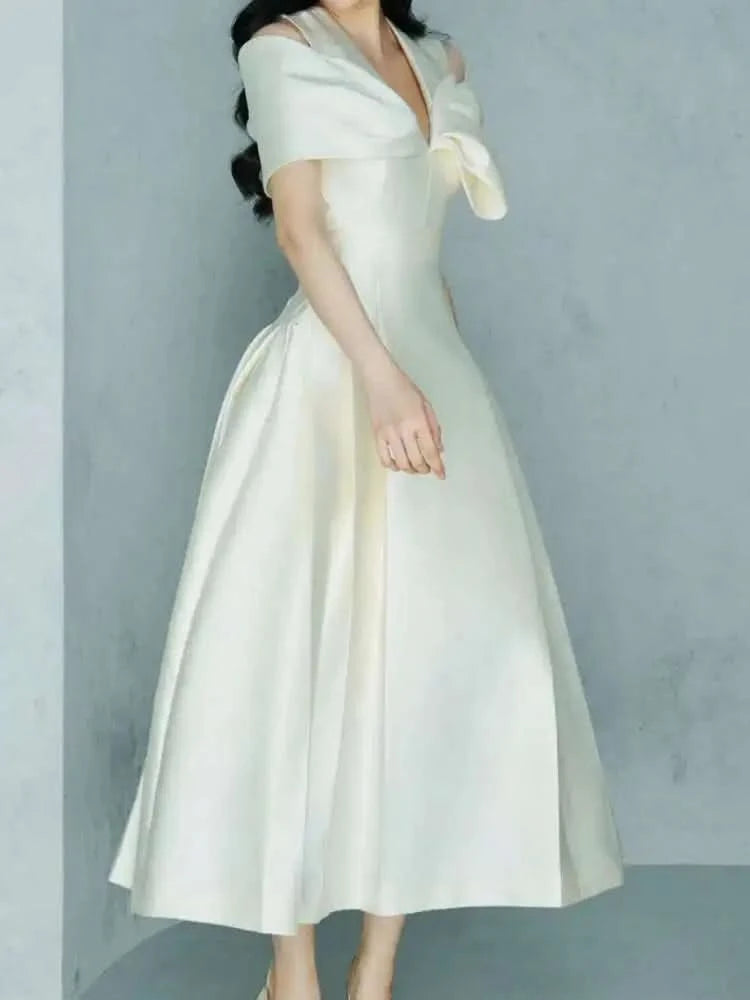 UCXQ Elegant Long Dress Fairy Style V-neck Hollow Waist 3D Bow Pocket Fashion Party Dresses For Women 2025 Spring Summer 23A9338 - M & M Global