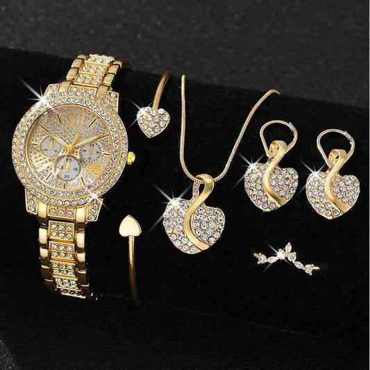 Women's gold quartz watch and jewelry set with rhinestones, featuring a watch, ring, necklace, and earrings on a black background.