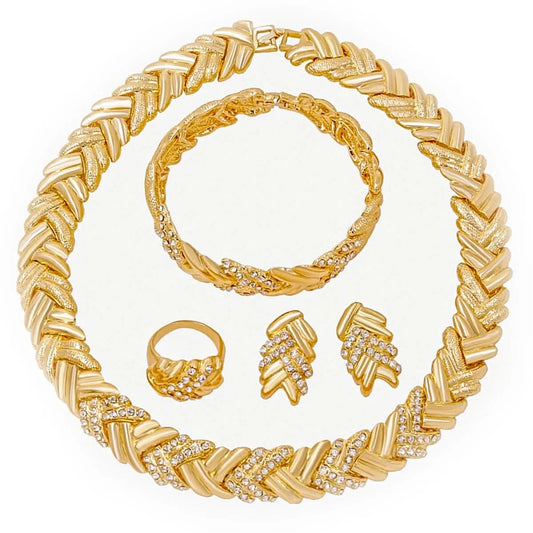 Gold color crystal jewelry set for women featuring a necklace, bracelet, earrings, and ring; perfect for weddings.