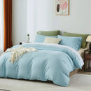 Bed with light blue bedding and green pillows in a room with a lamp and plant.
Microfiber Bedding Set, Queen Comforter Set, Lightweight Comforter, Pinch Pleat Bedding, Quilted Comforter, Solid Color Bedding, Soft Bedding Set, Elegant Bedding, All Season Comforter, Brushed Microfiber, Modern Bedroom Decor, Gift Bedding Set, Fade Resistant Bedding, Cozy Bedding Set, Hotel Style Bedding, Bedroom Essentials, Bed Comforter with Pillowcases, Non-Toxic Bedding, Machine Washable Bedding, Minimalist Bedding
