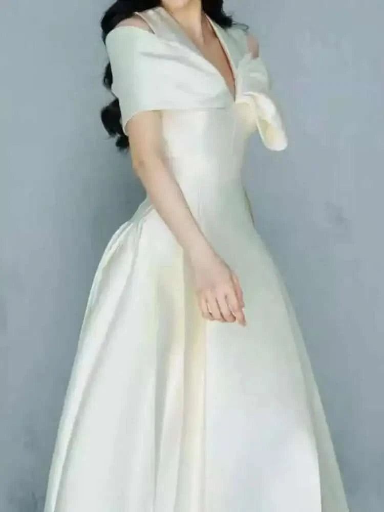 UCXQ Elegant Long Dress Fairy Style V-neck Hollow Waist 3D Bow Pocket Fashion Party Dresses For Women 2025 Spring Summer 23A9338 - M & M Global