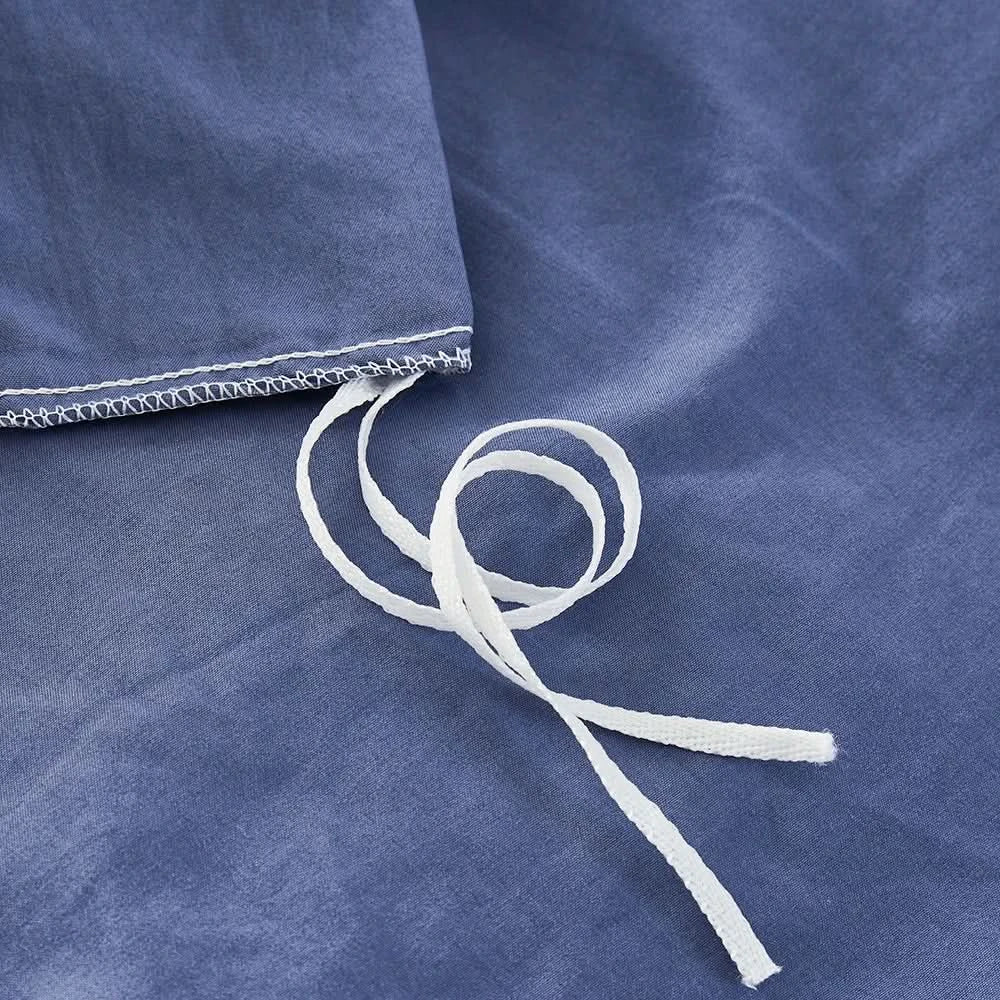 Close-up of blue fabric with white lace trim on a matching blue background
Microfiber Bedding Set, Queen Comforter Set, Lightweight Comforter, Pinch Pleat Bedding, Quilted Comforter, Solid Color Bedding, Soft Bedding Set, Elegant Bedding, All Season Comforter, Brushed Microfiber, Modern Bedroom Decor, Gift Bedding Set, Fade Resistant Bedding, Cozy Bedding Set, Hotel Style Bedding, Bedroom Essentials, Bed Comforter with Pillowcases, Non-Toxic Bedding, Machine Washable Bedding, Minimalist Bedding
