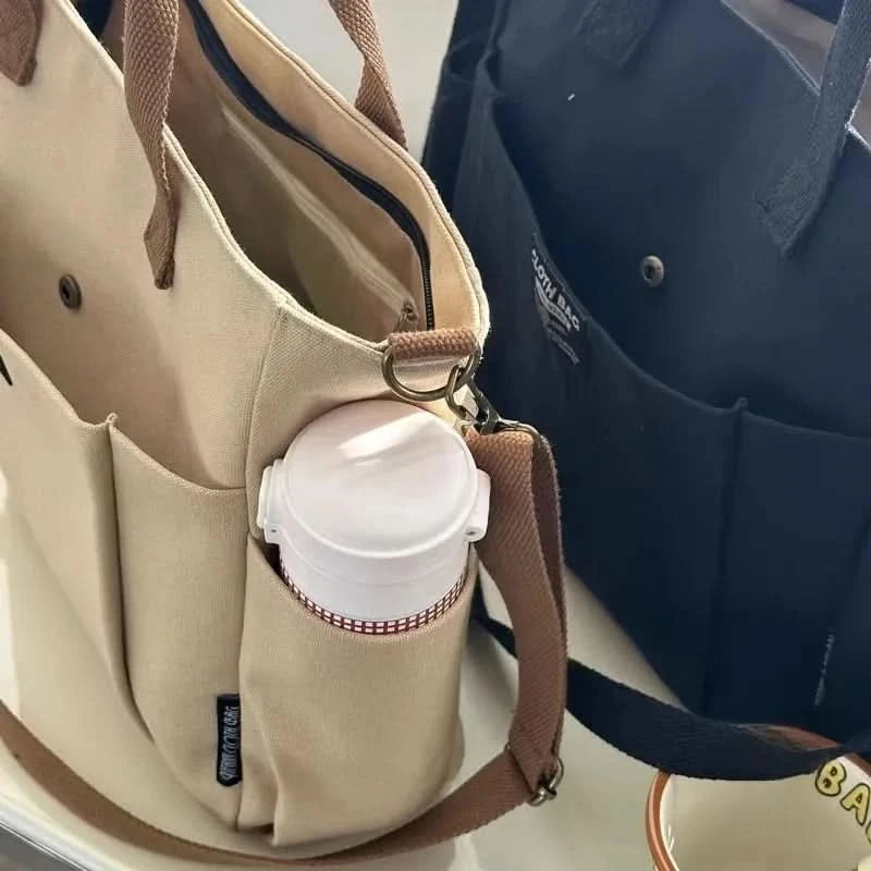 Urban Minimalist Female Student Large Capacity Commuting Horizontal Canvas Single Shoulder Diagonal Cross Portable Tote Bag - M & M Global